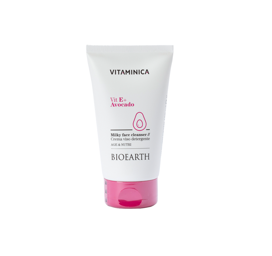 Tubo blanco y rosa de la leche limpiadora Bioearth Vitaminica con vitamina E y aguacate de 150 ml
