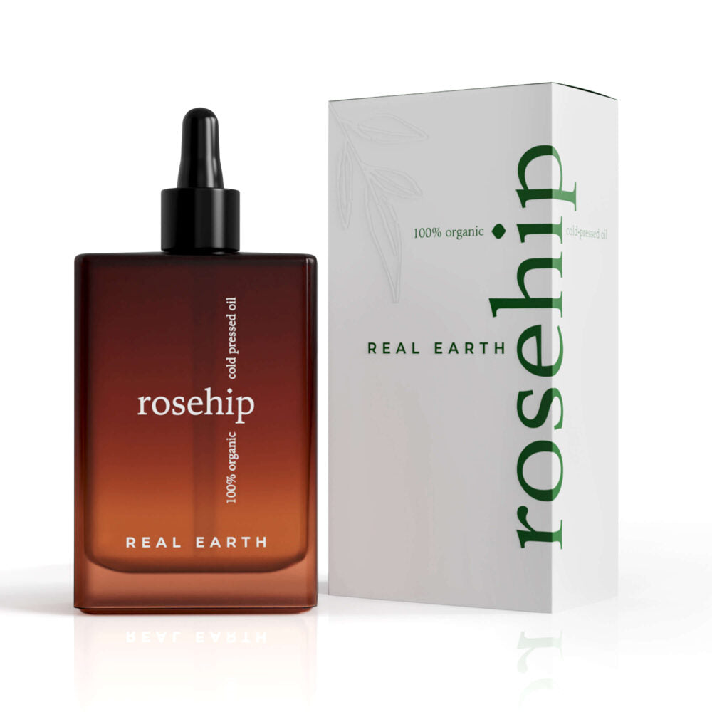 Frasco con cuentagotas y caja de aceite de rosa mosqueta Real Earth Stories Rosehip 100 ml