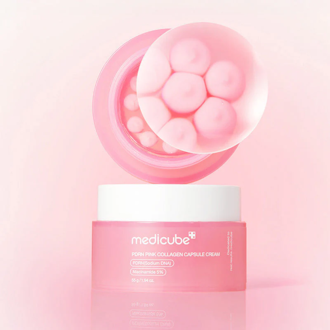 Textura con capsulas rosas de la crema Medicube PDRN