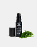 Sérum antiojeras con ingredientes naturales como aguacate y Reishi.
