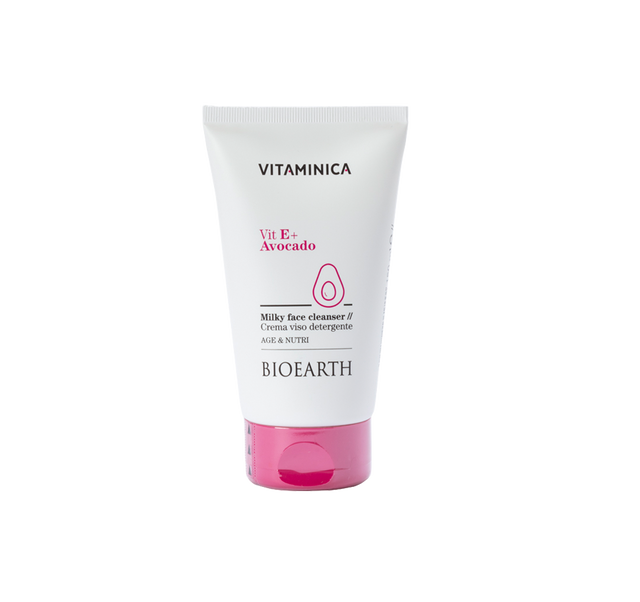 Tubo blanco y rosa de la leche limpiadora Bioearth Vitaminica con vitamina E y aguacate de 150 ml