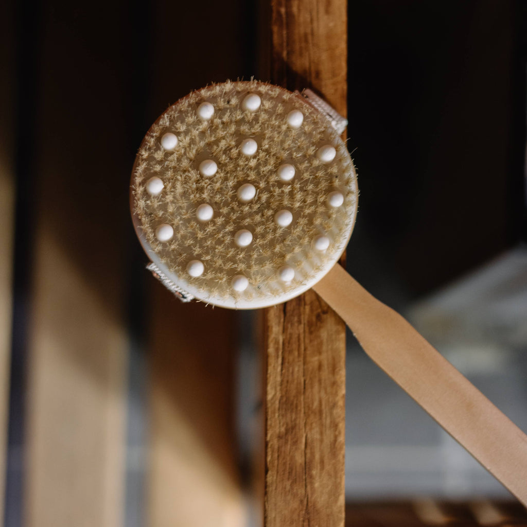 Cepillo de masaje con púas