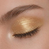 Muestra del tono dorado cálido JOIK 06 Golden Goddess sobre el párpado