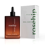 Frasco con cuentagotas y caja de aceite de rosa mosqueta Real Earth Stories Rosehip 100 ml